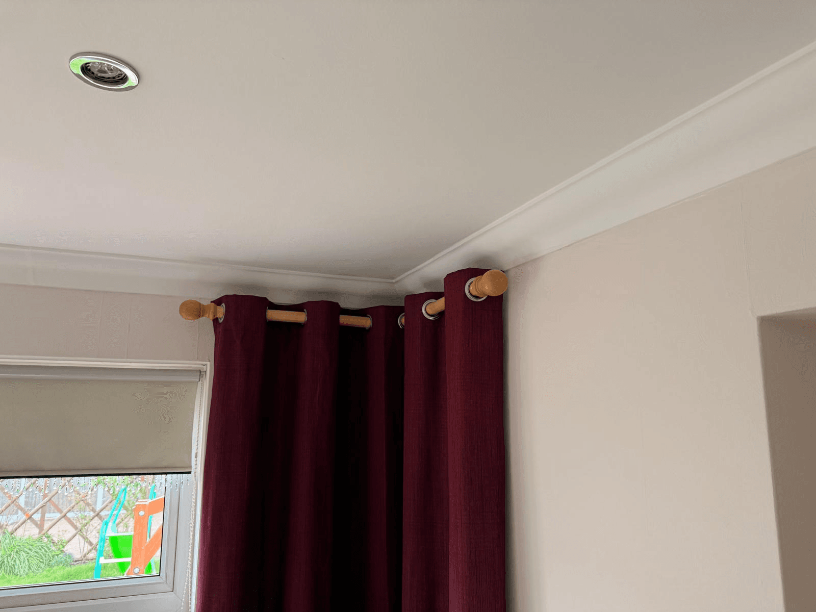 Freshly plastered room with fitted coving, spotlights and curtain rail